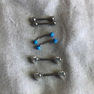 THREE pairs of nipple rings